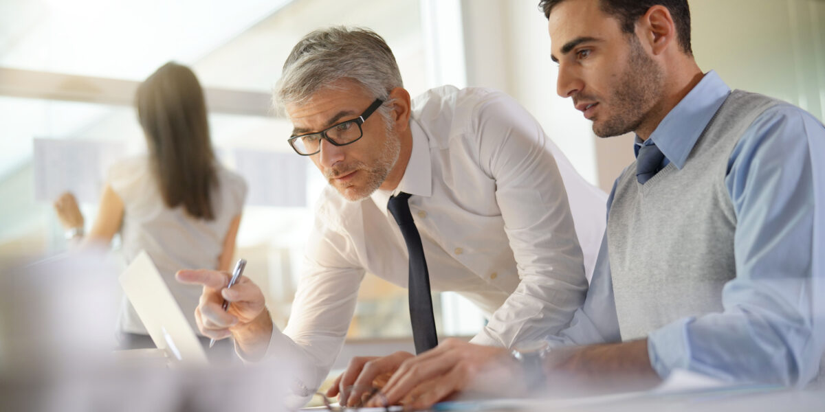 Financial people working together on budget in office